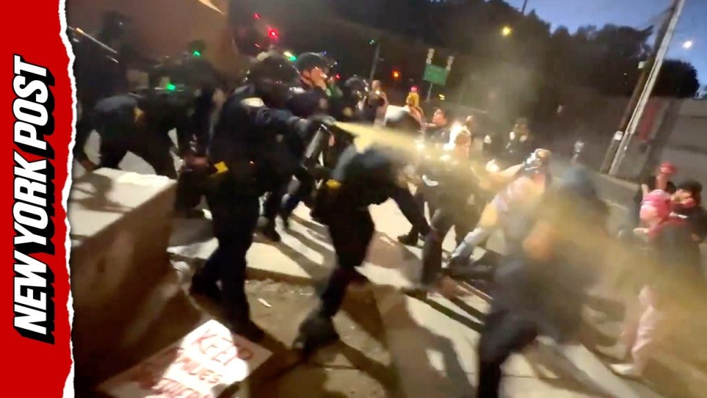 Police pepper spray anti-ICE protesters and throw woman to ground in Portland
